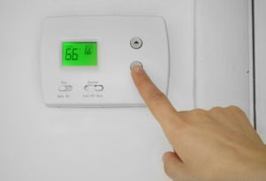 adjust wall thermostat